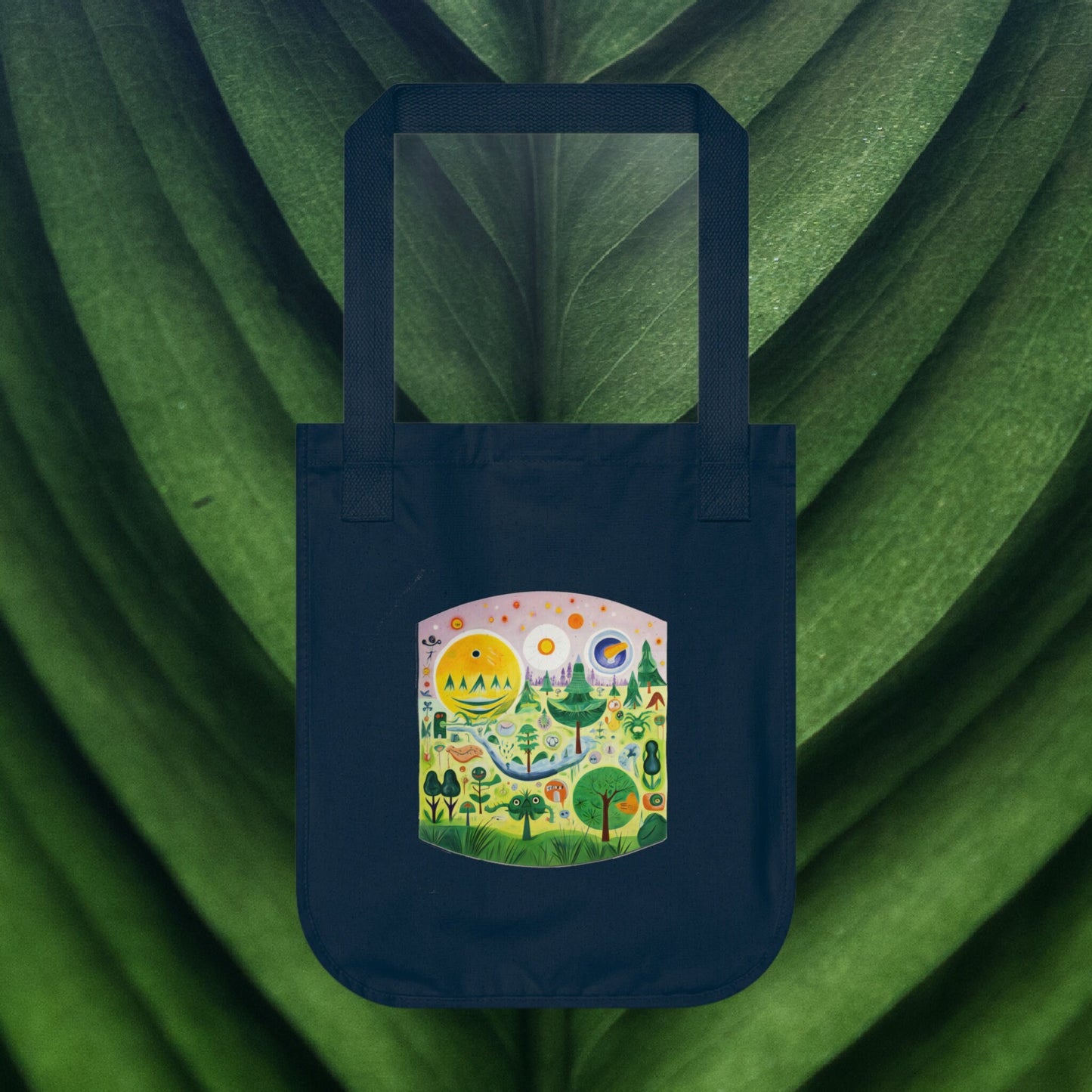a blue bag with a picture of a forest on it